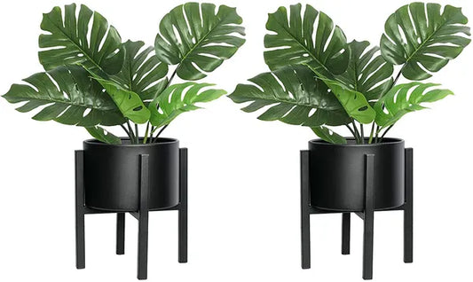 Black metal floor-standing plant stand with a black pot
